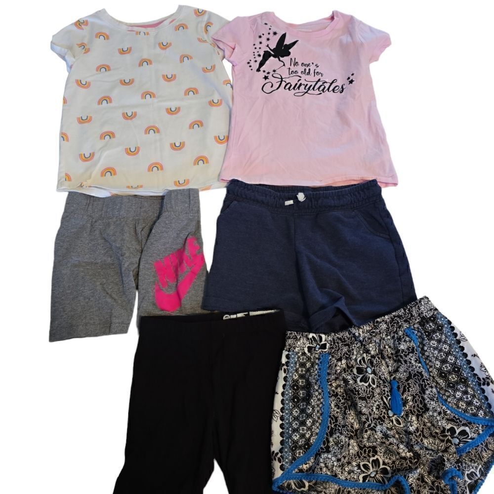 Lot of 6 pieces. 2 shirts and 4 shorts Size 6/7